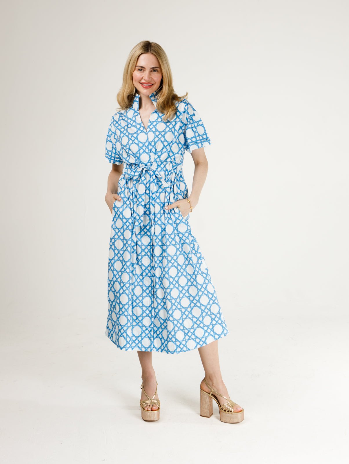 holly shae dresses Bria Dress Model is wearing a Dungare Dress Denim Dungaree silhouette:A-line Size:US26